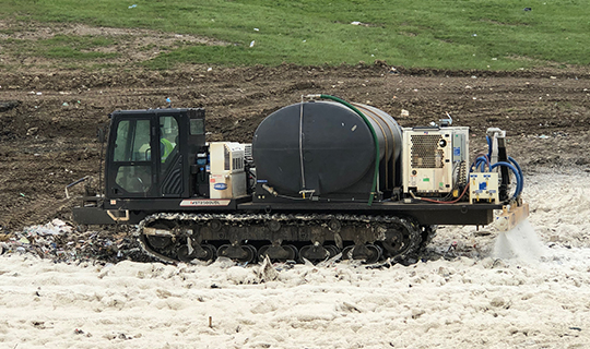 Daily cover foam equipment in use